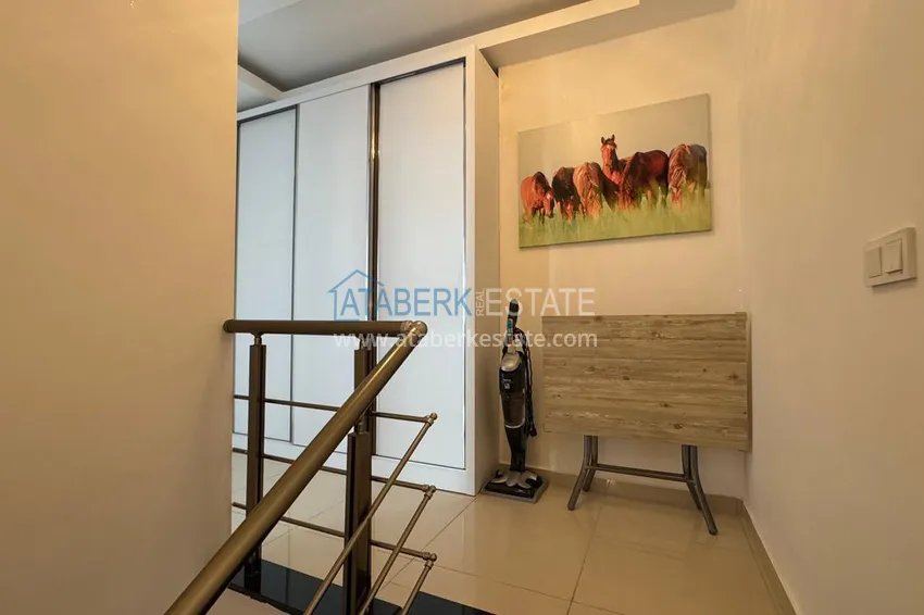 Приобрести Видовой пентхаус с мебелью в комплексе на центральной улице района Махмутлар 16 