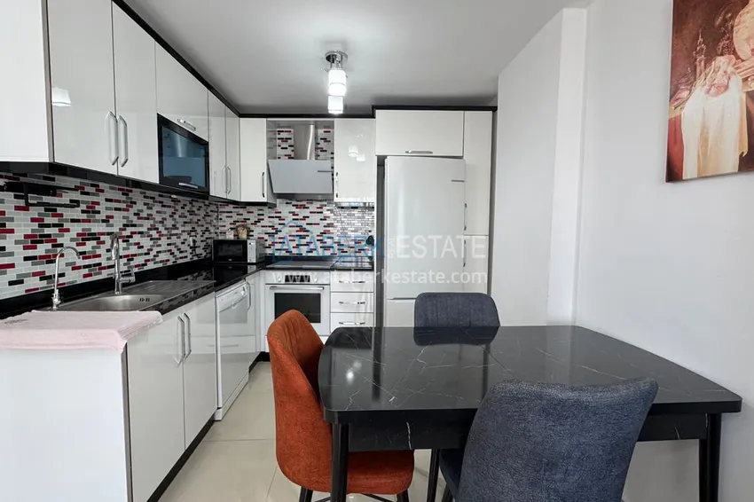 Приобрести Видовой пентхаус с мебелью в комплексе на центральной улице района Махмутлар 20 