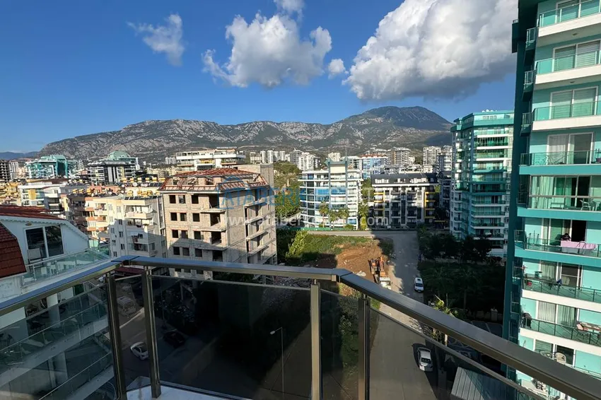 Приобрести Видовой пентхаус с мебелью в комплексе на центральной улице района Махмутлар 28 