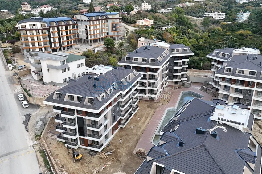 Фото - 🔥Наш проект! Недорогая инвестиционная недвижимость без посредников на этапе строительства в районе Оба, Алания 11