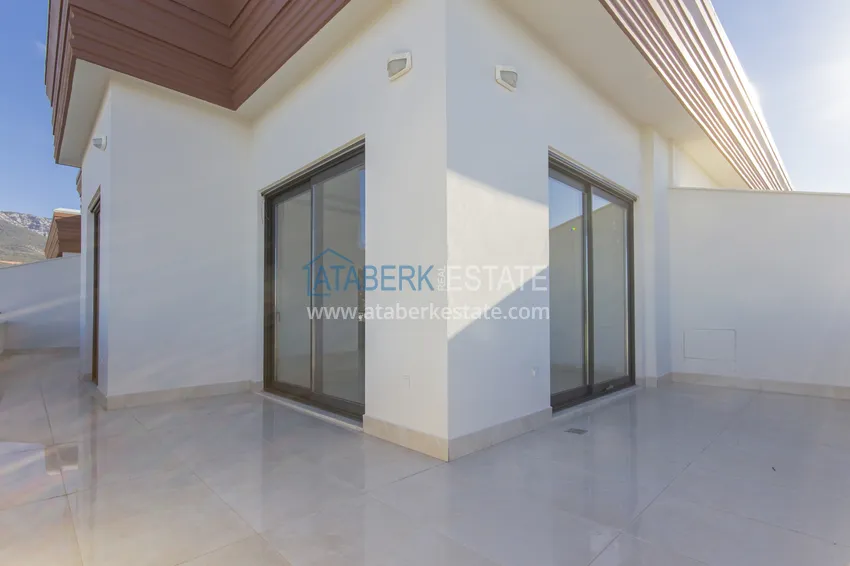 Приобрести Элитный двухэтажный пентхаус 4+1 с видом на море и крепость - центр Махмутлара 10 