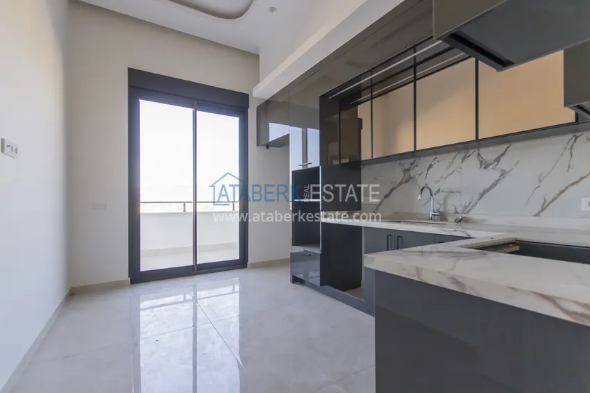 Приобрести Элитный двухэтажный пентхаус 4+1 с видом на море и крепость - центр Махмутлара 16 