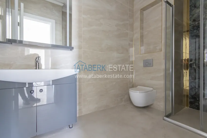 Приобрести Элитный двухэтажный пентхаус 4+1 с видом на море и крепость - центр Махмутлара 21 