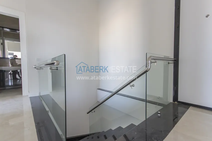 Приобрести Элитный двухэтажный пентхаус 4+1 с видом на море и крепость - центр Махмутлара 23 