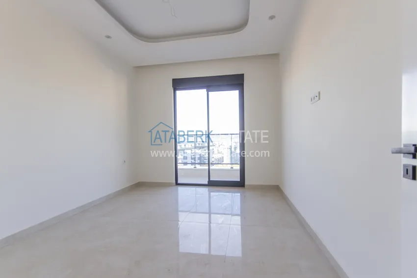 Приобрести Элитный двухэтажный пентхаус 4+1 с видом на море и крепость - центр Махмутлара 34 