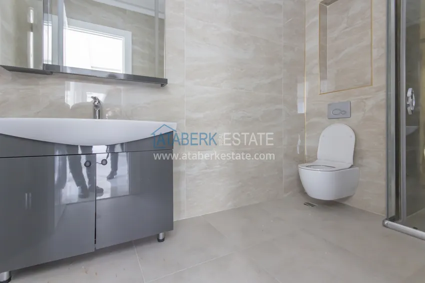 Приобрести Элитный двухэтажный пентхаус 4+1 с видом на море и крепость - центр Махмутлара 36 