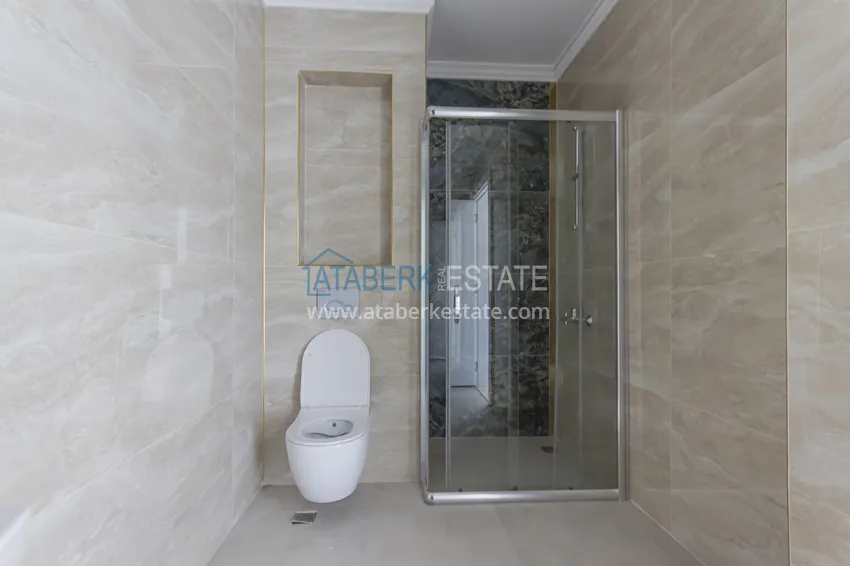 Приобрести Элитный двухэтажный пентхаус 4+1 с видом на море и крепость - центр Махмутлара 37 