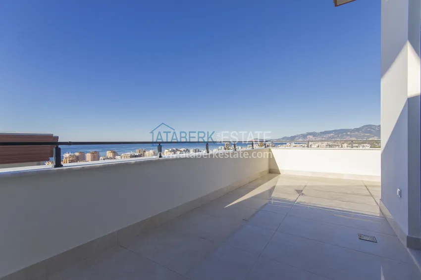 Приобрести Элитный двухэтажный пентхаус 4+1 с видом на море и крепость - центр Махмутлара 8 