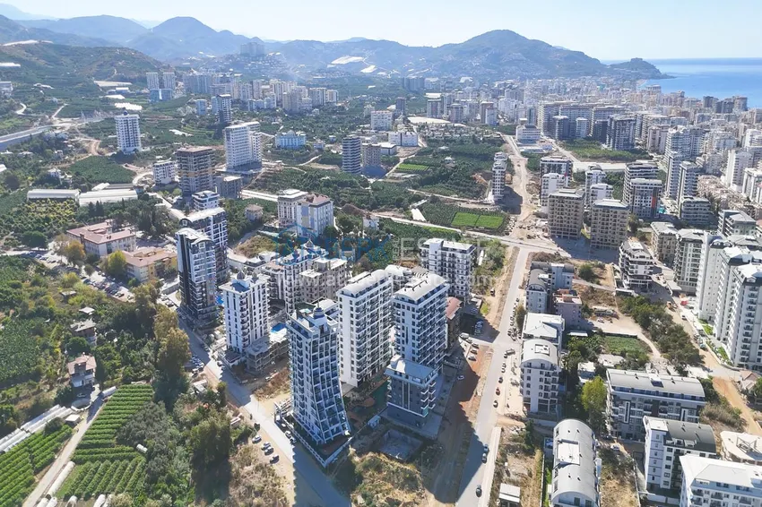 Квартира 1+1 с видом на горы в Махмутларе - комплекс курортного формата 2