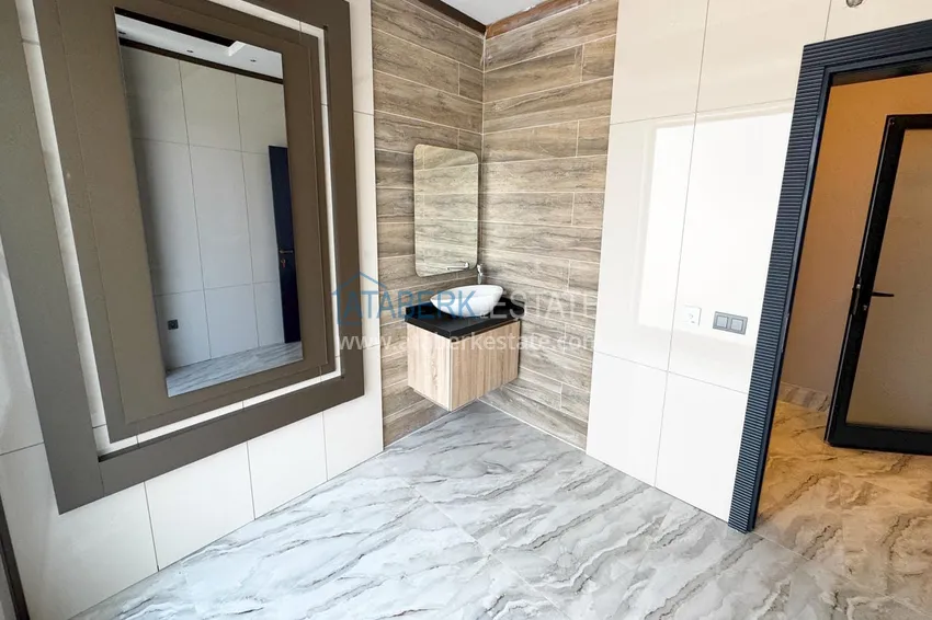 Квартира 1+1 с видом на горы в Махмутларе - комплекс курортного формата 31