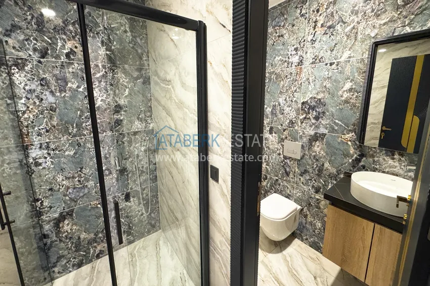 Квартира 1+1 с видом на горы в Махмутларе - комплекс курортного формата 32