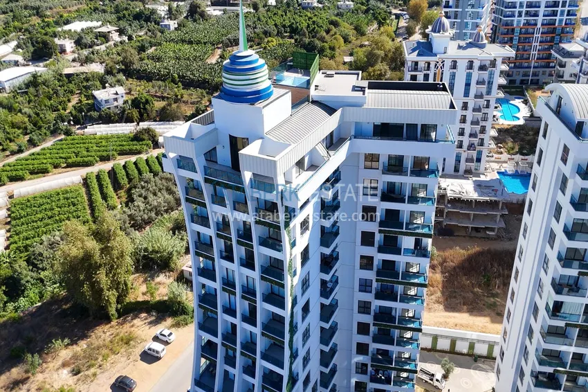 Квартира 1+1 с видом на горы в Махмутларе - комплекс курортного формата 8