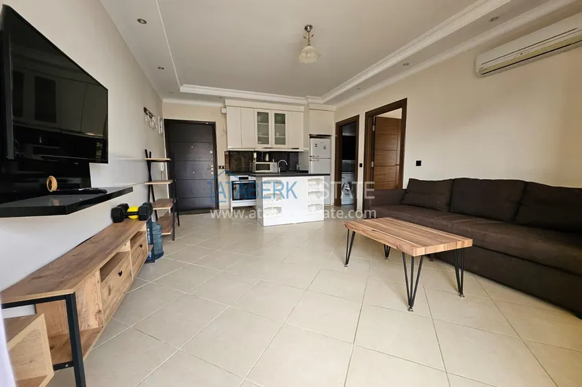 Приобрести Квартира 1+1 с мебелью в центре района Оба - в 100 метрах от моря 7