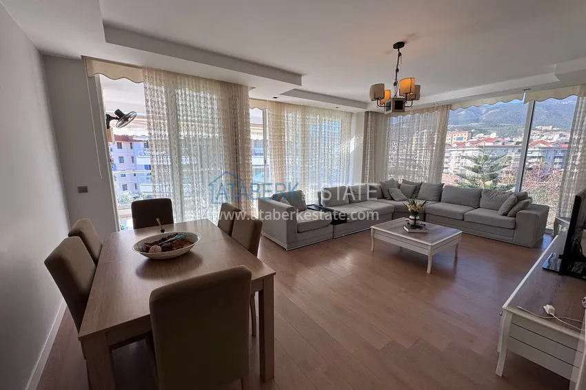 Приобрести Линейная квартира 3+1 в районе Оба, с мебелью и отдельной кухней - подходит для ВНЖ и гражданства 4