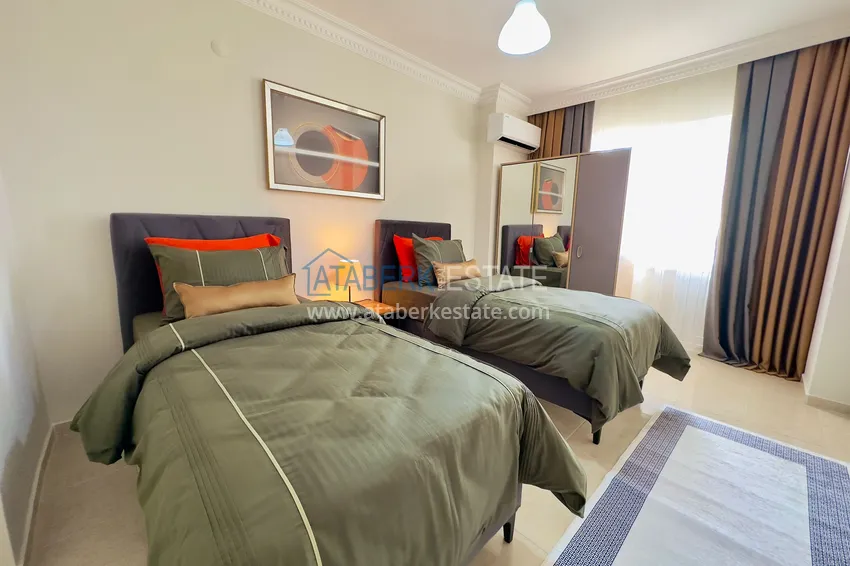 Приобрести Квартира 2+1 с видом на море и отдельной кухней - 200 метров до моря, район Махмутлар 13 