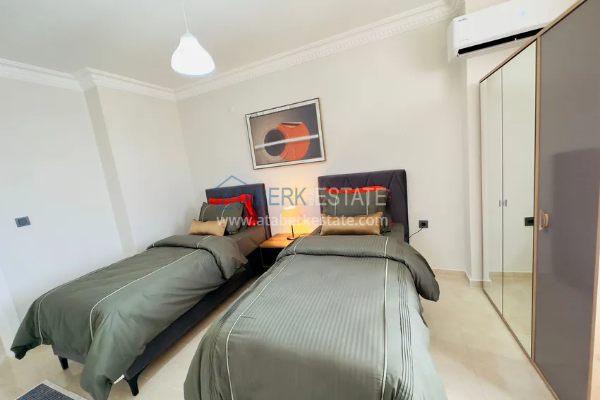 Приобрести Квартира 2+1 с видом на море и отдельной кухней - 200 метров до моря, район Махмутлар 14 