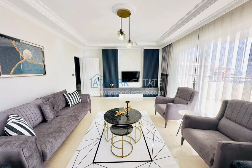 Приобрести Квартира 2+1 с видом на море и отдельной кухней - 200 метров до моря, район Махмутлар 5 