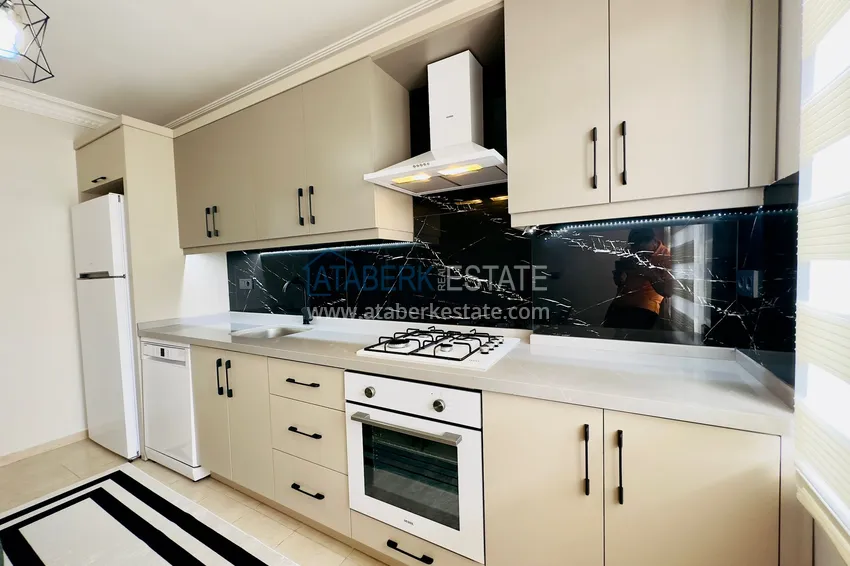 Приобрести Квартира 2+1 с видом на море и отдельной кухней - 200 метров до моря, район Махмутлар 9 