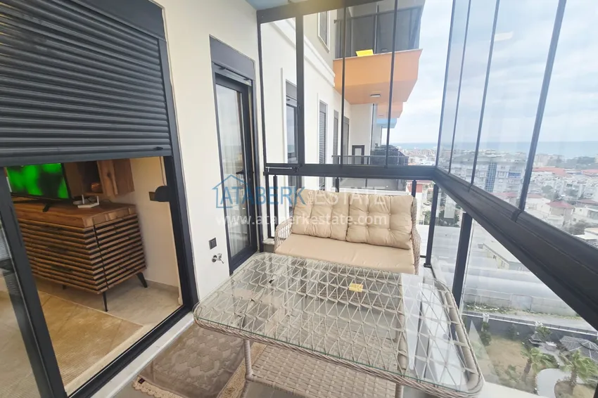 Приобрести Квартира от собственника в Алании, район Авсаллар - с мебелью, видом на море и остекленным балконом 13 