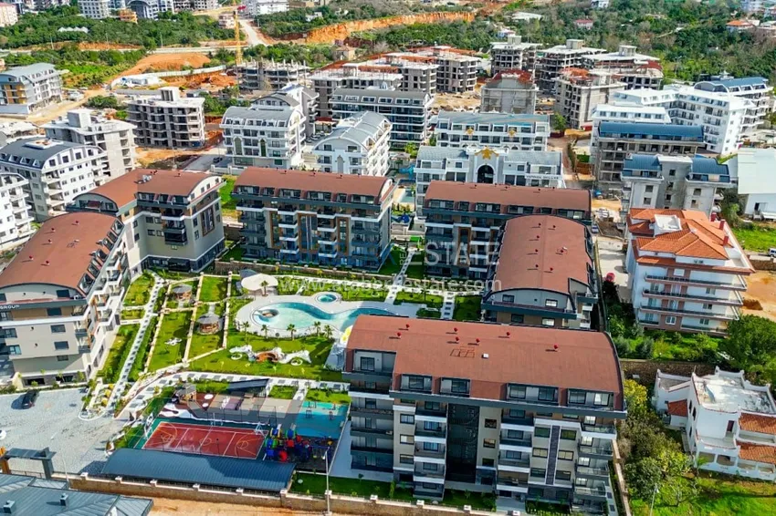 Квартира 1+1 в районе Оба с чистовой отделкой  6 