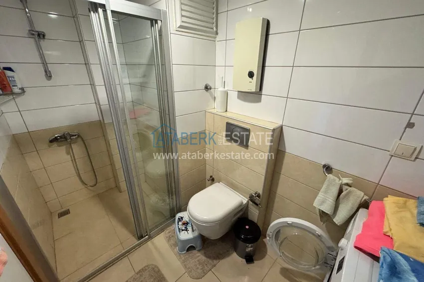 Приобрести Квартира 1+1 с мебелью в районе Джикджилли - недвижимость в Алании под ВНЖ 12