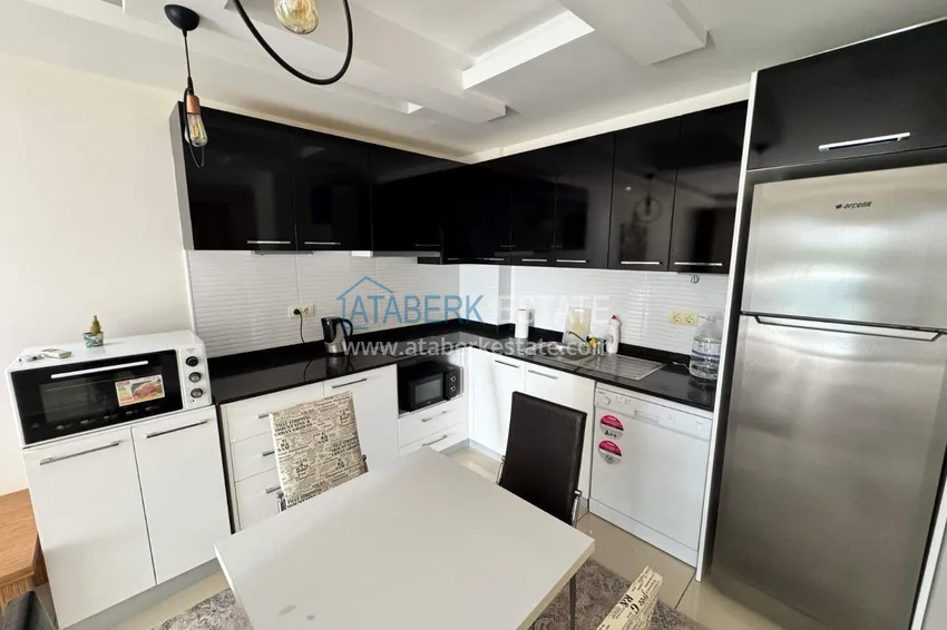 Приобрести Квартира 1+1 с мебелью в районе Джикджилли - недвижимость в Алании под ВНЖ 5