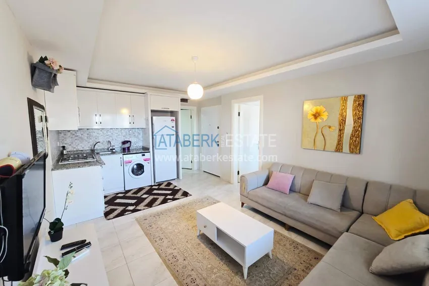 Приобрести Квартира 1+1 с мебелью, видом на море и горы в центре Махмутлара - 400 м до пляжа 1 