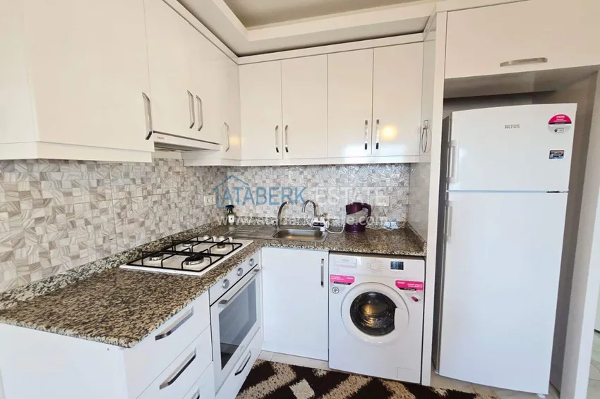 Приобрести Квартира 1+1 с мебелью, видом на море и горы в центре Махмутлара - 400 м до пляжа 4 