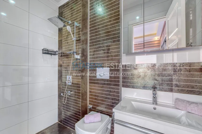 Приобрести Триплекс-вилла 5+1 под гражданство и ВНЖ в Алании, Бекташ – с мебелью и панорамным видом  58 