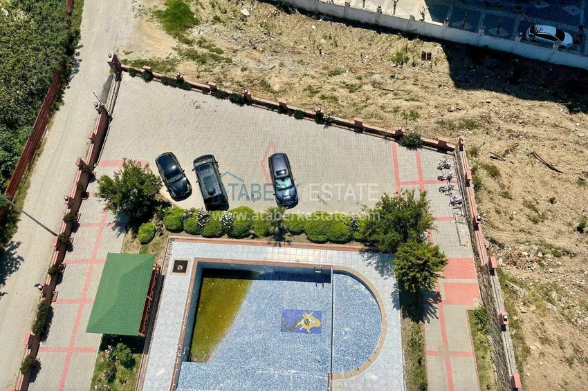 Приобрести Квартира 2+1 в центре Махмутлара – южная сторона, новая мебель, отдельная кухня 17 