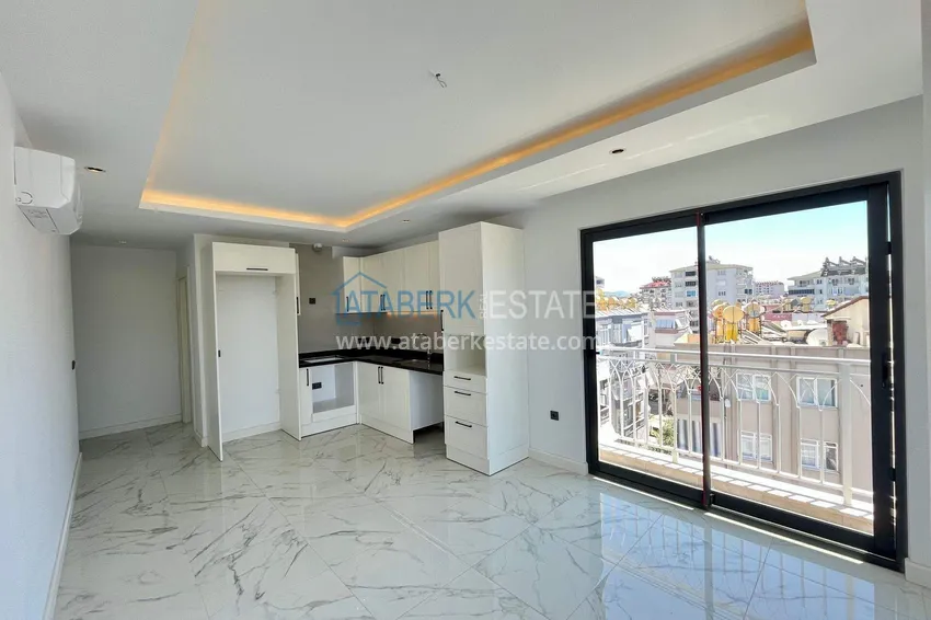 Приобрести Квартира 2+1 с видом в центре Алании, район пляжа Клеопатра 4 