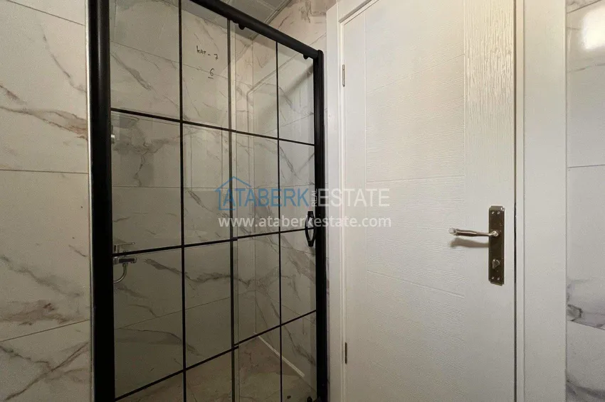 Приобрести Квартира 1+1 57 м² с видом на море в Махмутларе - современный жилой комплекс 14 