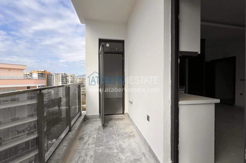 Приобрести Квартира 1+1 57 м² с видом на море в Махмутларе - современный жилой комплекс 7 