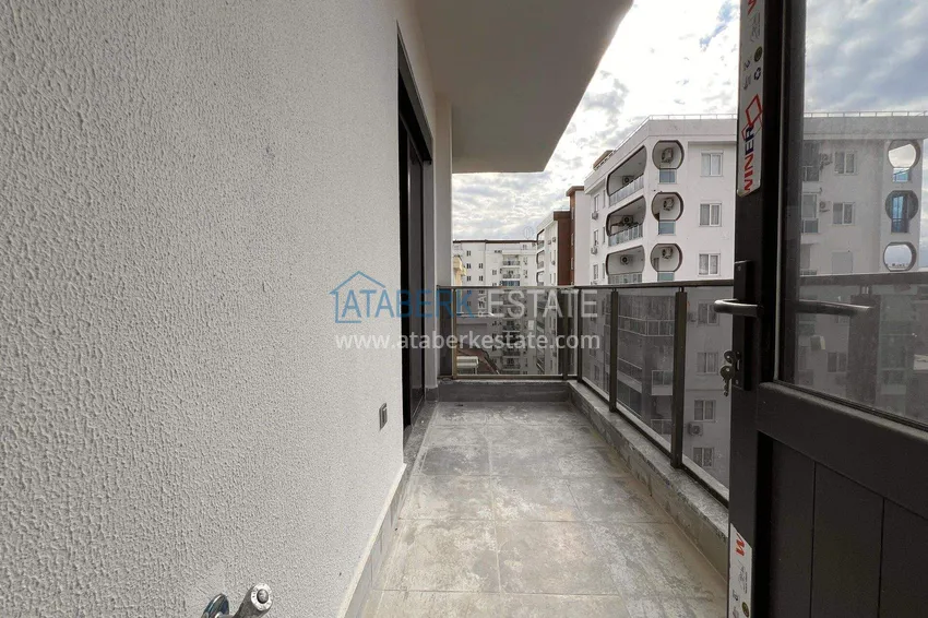 Приобрести Квартира 1+1 57 м² с видом на море в Махмутларе - современный жилой комплекс 8 