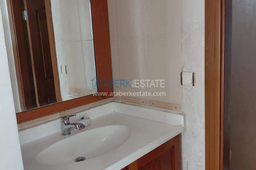 Приобрести Квартира 2+1 на первой береговой линии в Махмутларе 11 