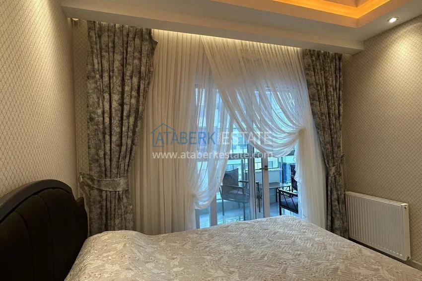 Приобрести Квартира 1+1 70 м² в центре Махмутлара – с мебелью, балкон остеклен, рассрочка до 1 года 11 