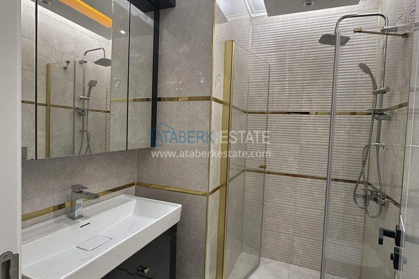 Приобрести Квартира 1+1 70 м² в центре Махмутлара – с мебелью, балкон остеклен, рассрочка до 1 года 12 