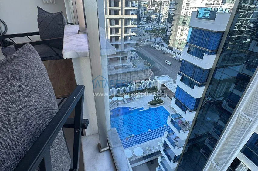Приобрести Квартира 1+1 70 м² в центре Махмутлара – с мебелью, балкон остеклен, рассрочка до 1 года 16 