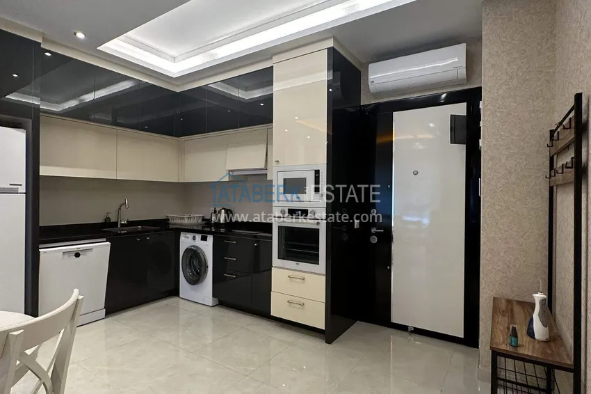 Приобрести Квартира 1+1 70 м² в центре Махмутлара – с мебелью, балкон остеклен, рассрочка до 1 года 3 