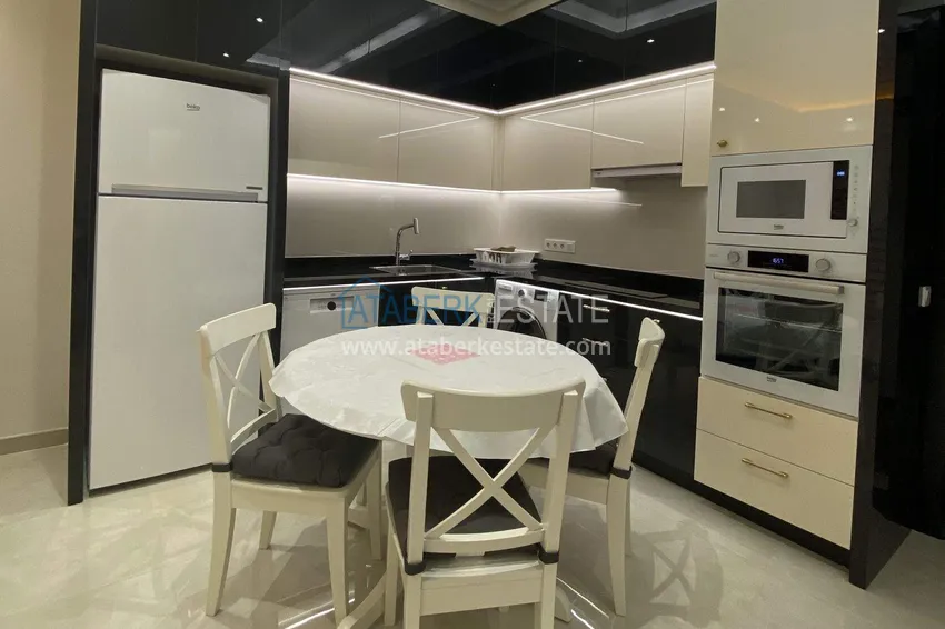 Приобрести Квартира 1+1 70 м² в центре Махмутлара – с мебелью, балкон остеклен, рассрочка до 1 года 4 