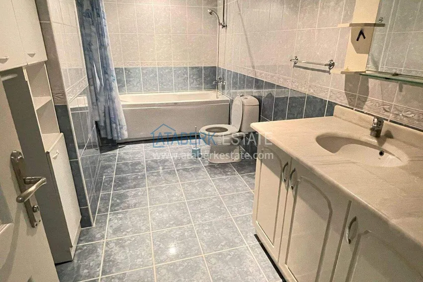 Приобрести Квартира 2+1 в Махмутларе с мебелью, отдельной кухней и остеклённым балконом  13 
