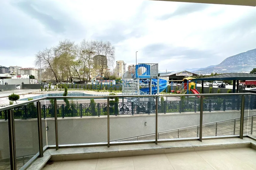 Приобрести Квартира 1+1 с новой мебелью в Махмутларе - 400 метров до моря, улица Ататюрка 12 