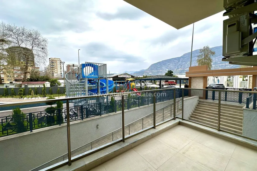 Приобрести Квартира 1+1 с новой мебелью в Махмутларе - 400 метров до моря, улица Ататюрка 13 