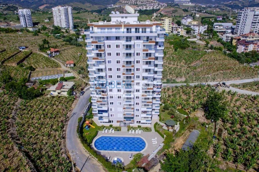 Квартира 1+1 в Махмутларе – новая мебель, 70 м², остекленный балкон, вид на море и горы 1 