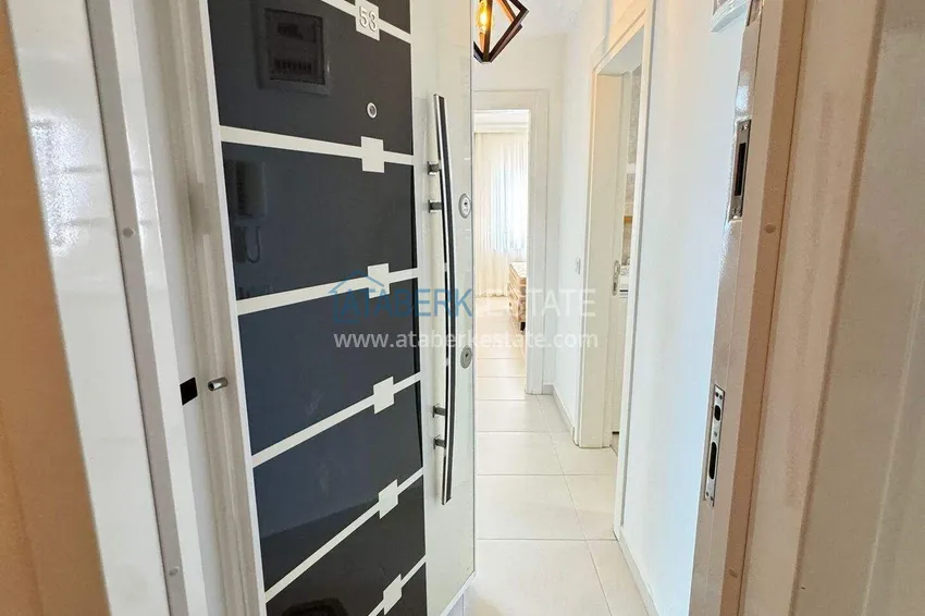 Приобрести Квартира 1+1 в Махмутларе – новая мебель, 70 м², остекленный балкон, вид на море и горы 1 
