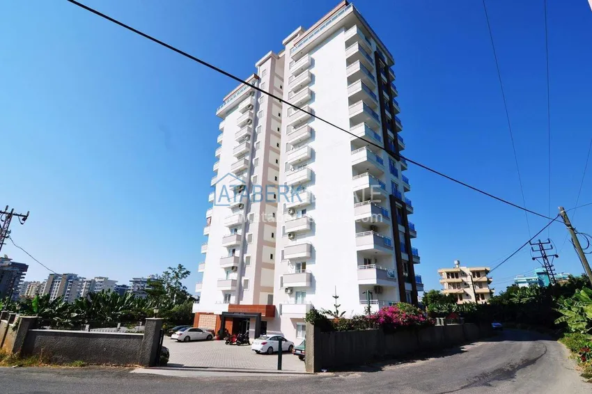 Квартира 1+1 в Махмутларе – новая мебель, 70 м², остекленный балкон, вид на море и горы 3 