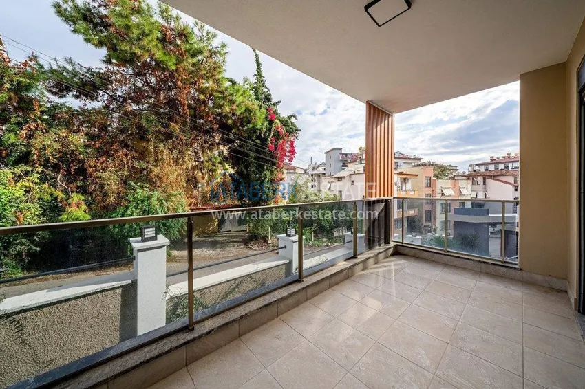 Приобрести Трехкомнатная квартира в центре Алании - новая недвижимость в резиденции комфорт-класса 9 