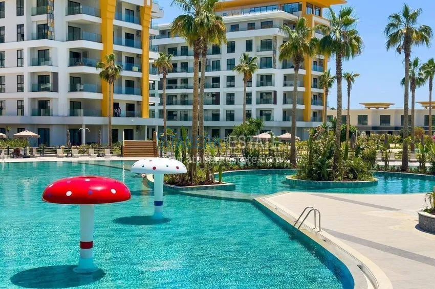Недвижимость в Алании - квартира 1+1 85 м2 с мебелью в премиальном resort-комплексе, район Тюрклер 20 