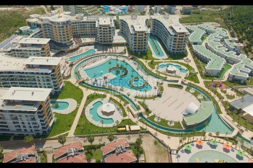 Недвижимость в Алании - квартира 1+1 85 м2 с мебелью в премиальном resort-комплексе, район Тюрклер 10 
