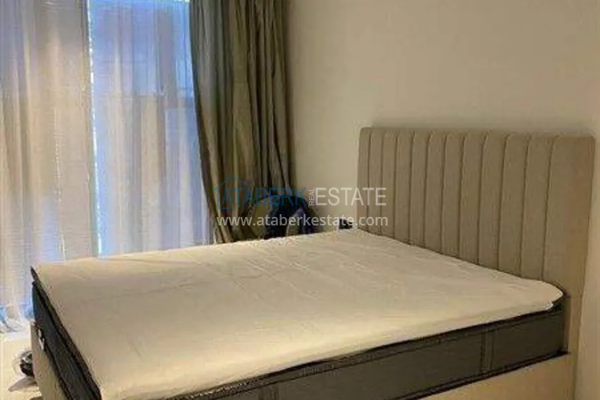 Приобрести Недвижимость в Алании - квартира 1+1 85 м2 с мебелью в премиальном resort-комплексе, район Тюрклер 4 